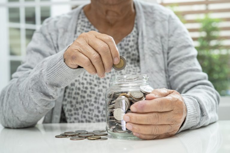 asian-senior-elderly-old-lady-woman-holding-counting-coin-money-glass-jar-poverty-saving-problem-retirement